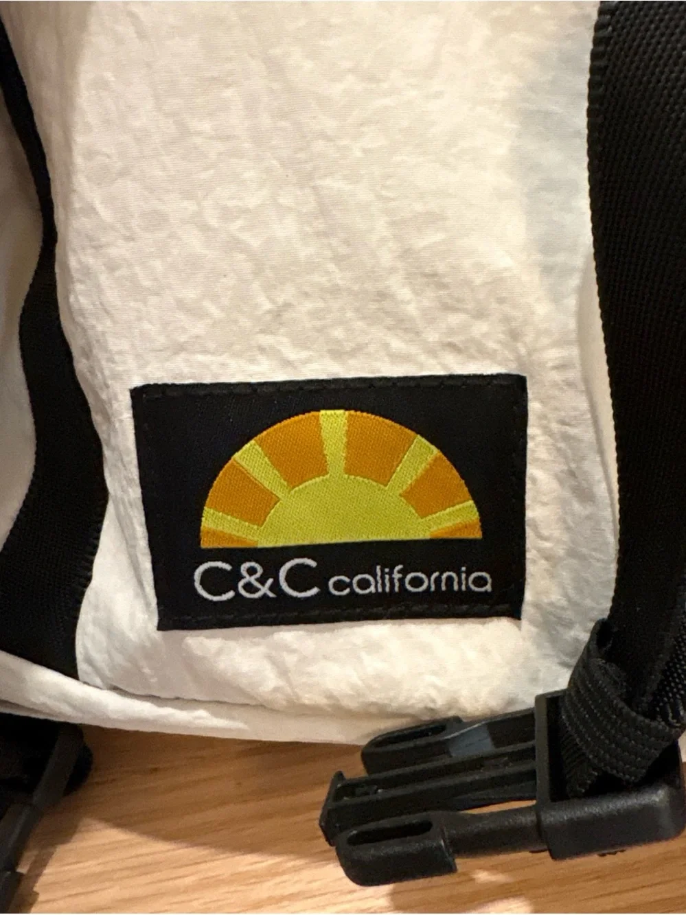 C&C California Cream and Black Roll-Top Backpack with Front Zip Pocket